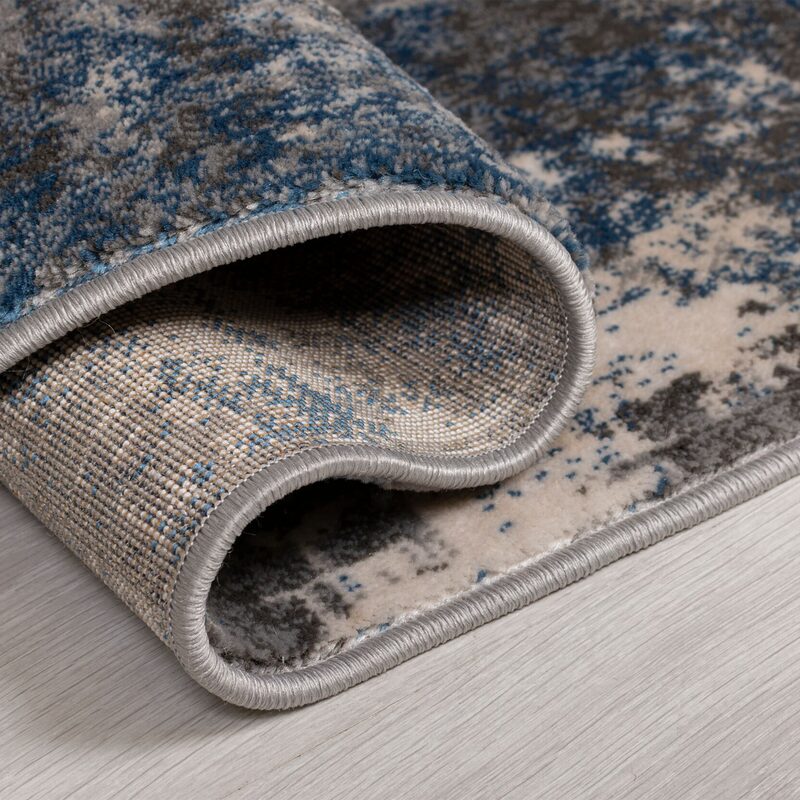 Tapis WONDERLUST coloris bleu gris 120 x 170 cm